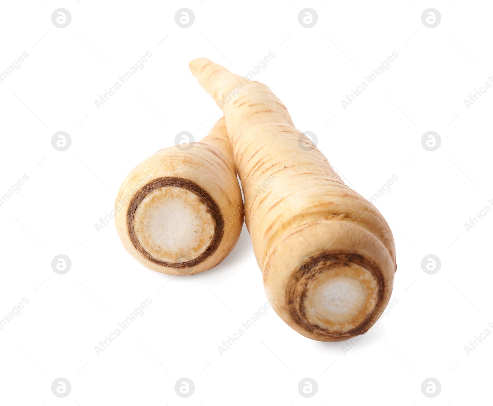 Photo of Tasty fresh ripe parsnips on white background