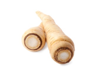 Photo of Tasty fresh ripe parsnips on white background