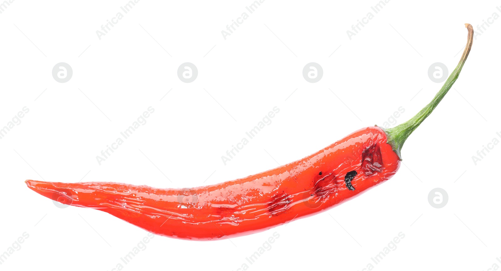 Photo of One grilled chili pepper isolated on white, top view