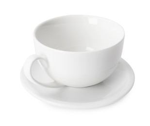 Photo of Ceramic cup and saucer isolated on white