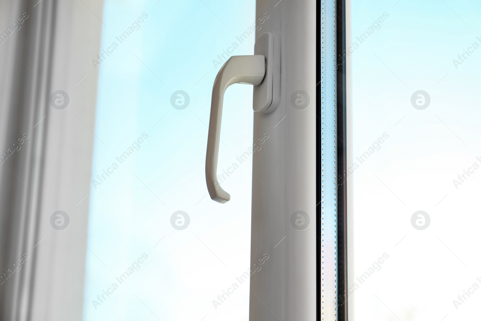 Photo of Modern window in room, closeup view. Home interior