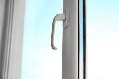 Photo of Modern window in room, closeup view. Home interior