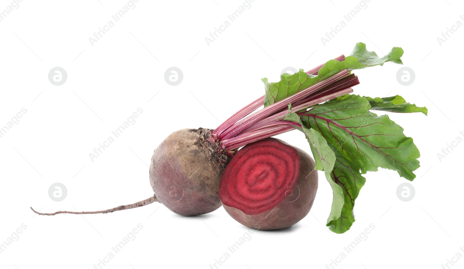 Photo of Whole and cut red beets on white background