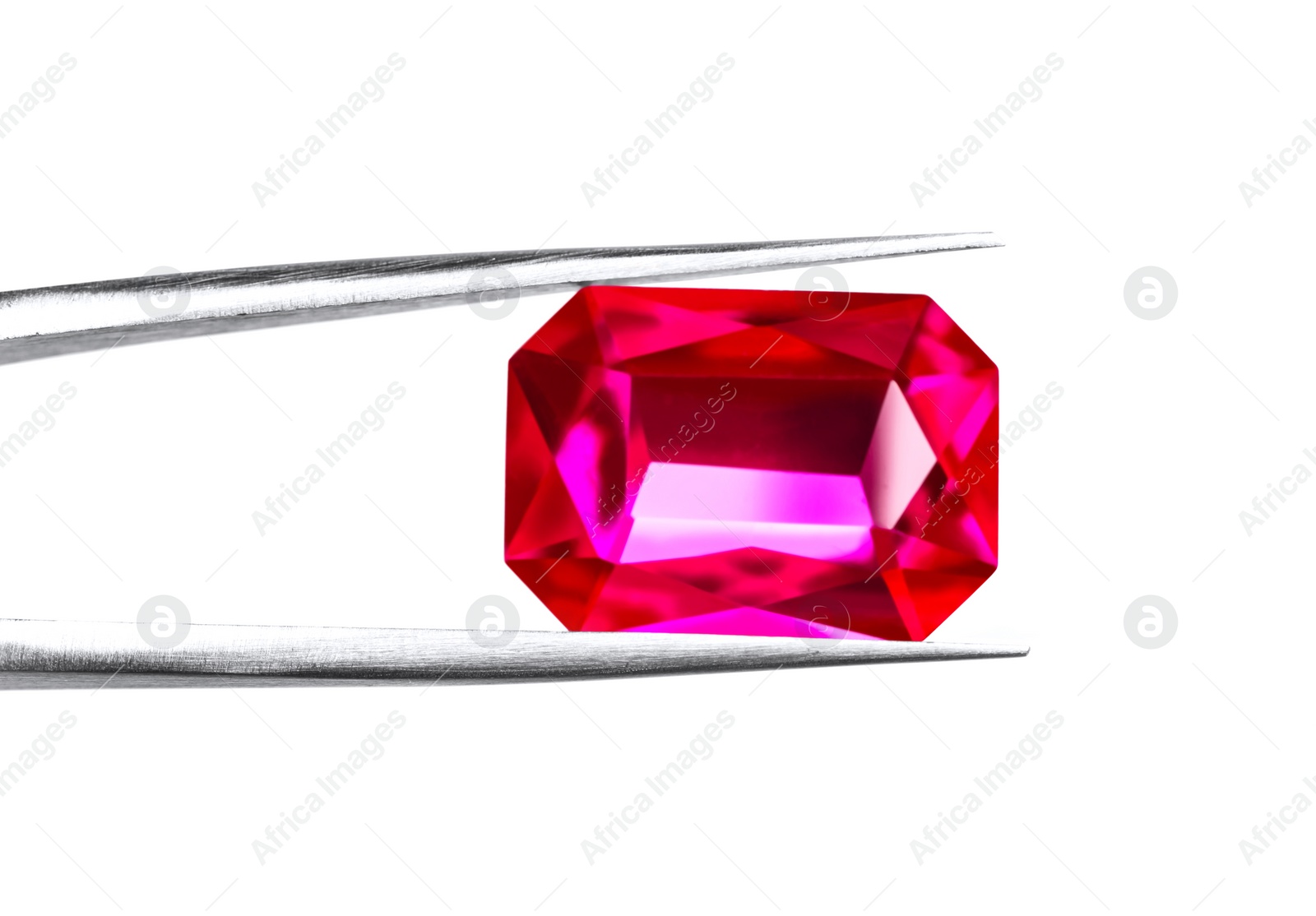 Photo of Tweezers with beautiful gemstone on white background