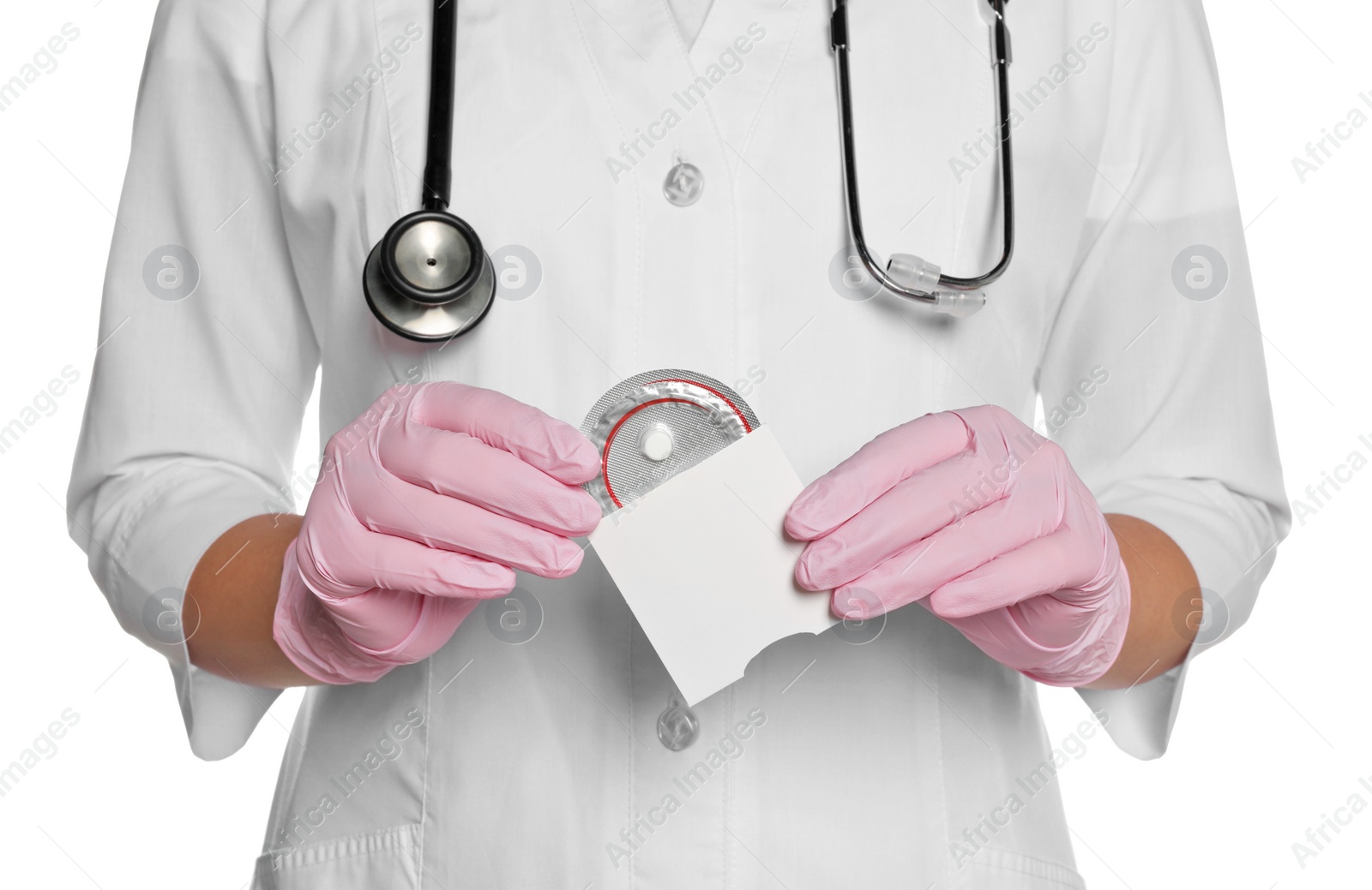 Photo of Doctor holding blister of emergency contraception pill on white background, closeup