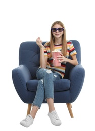 Photo of Teenage girl with 3D glasses and popcorn sitting in armchair during cinema show on white background