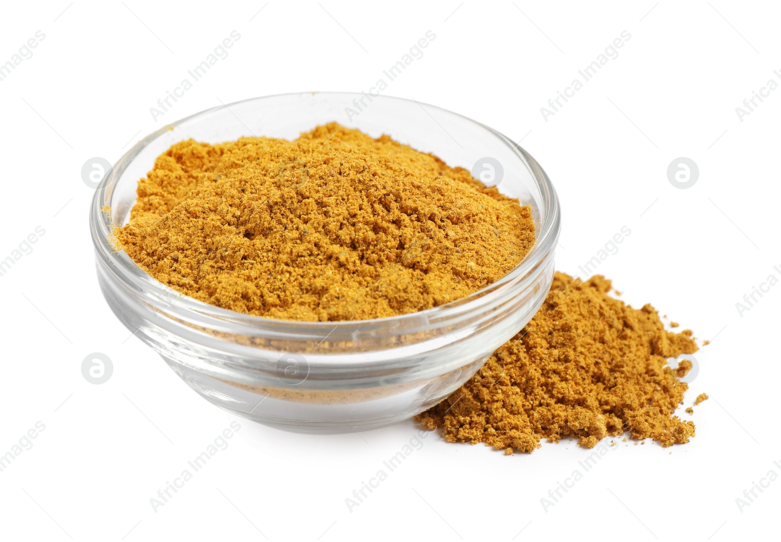 Photo of Curry powder in bowl isolated on white