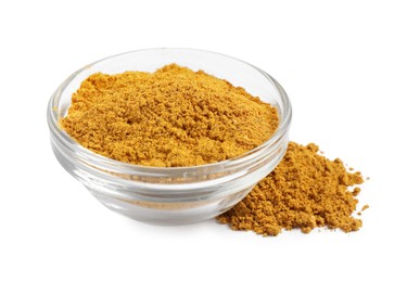 Photo of Curry powder in bowl isolated on white