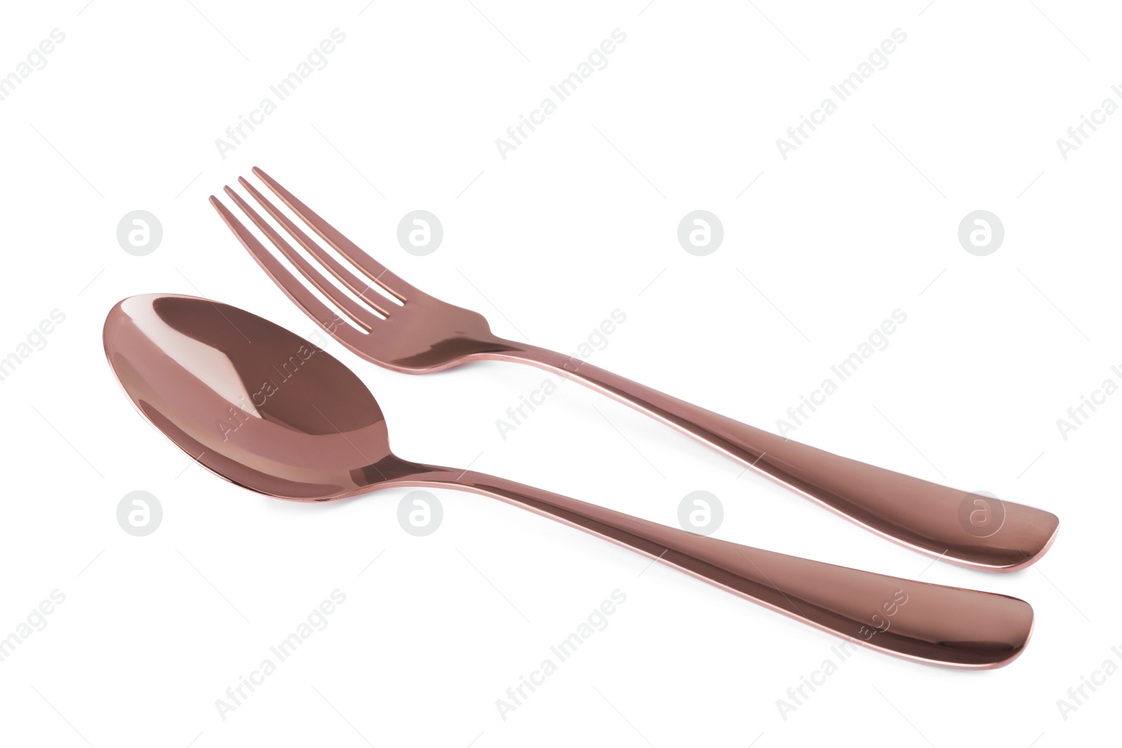 Photo of New shiny fork and spoon on white background