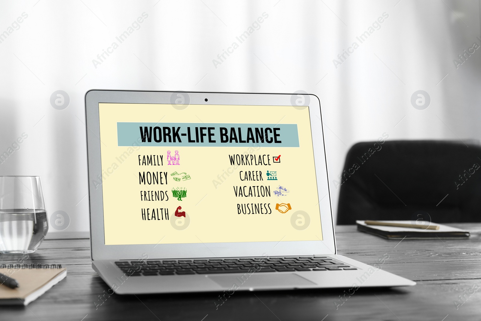 Image of Work-life balance concept. Modern laptop on wooden table in office