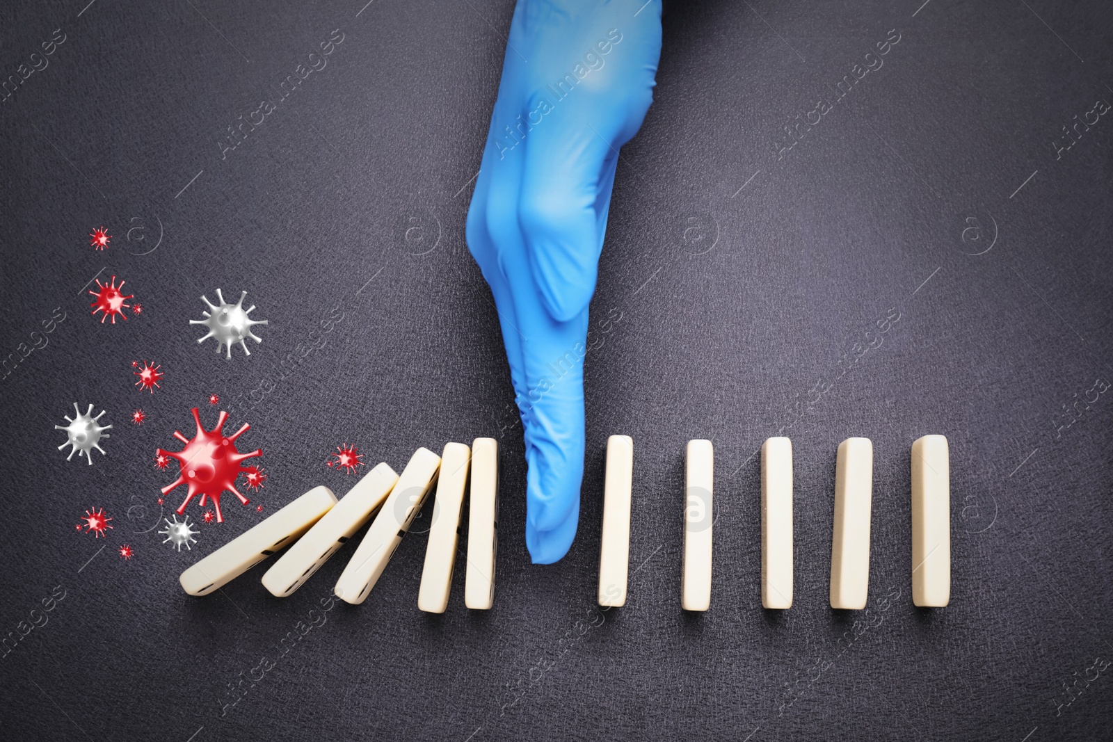 Image of Doctor stopping domino effect on grey background, top view. Prevent spreading of coronavirus