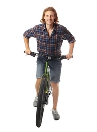 Photo of Happy young man riding bicycle on white background