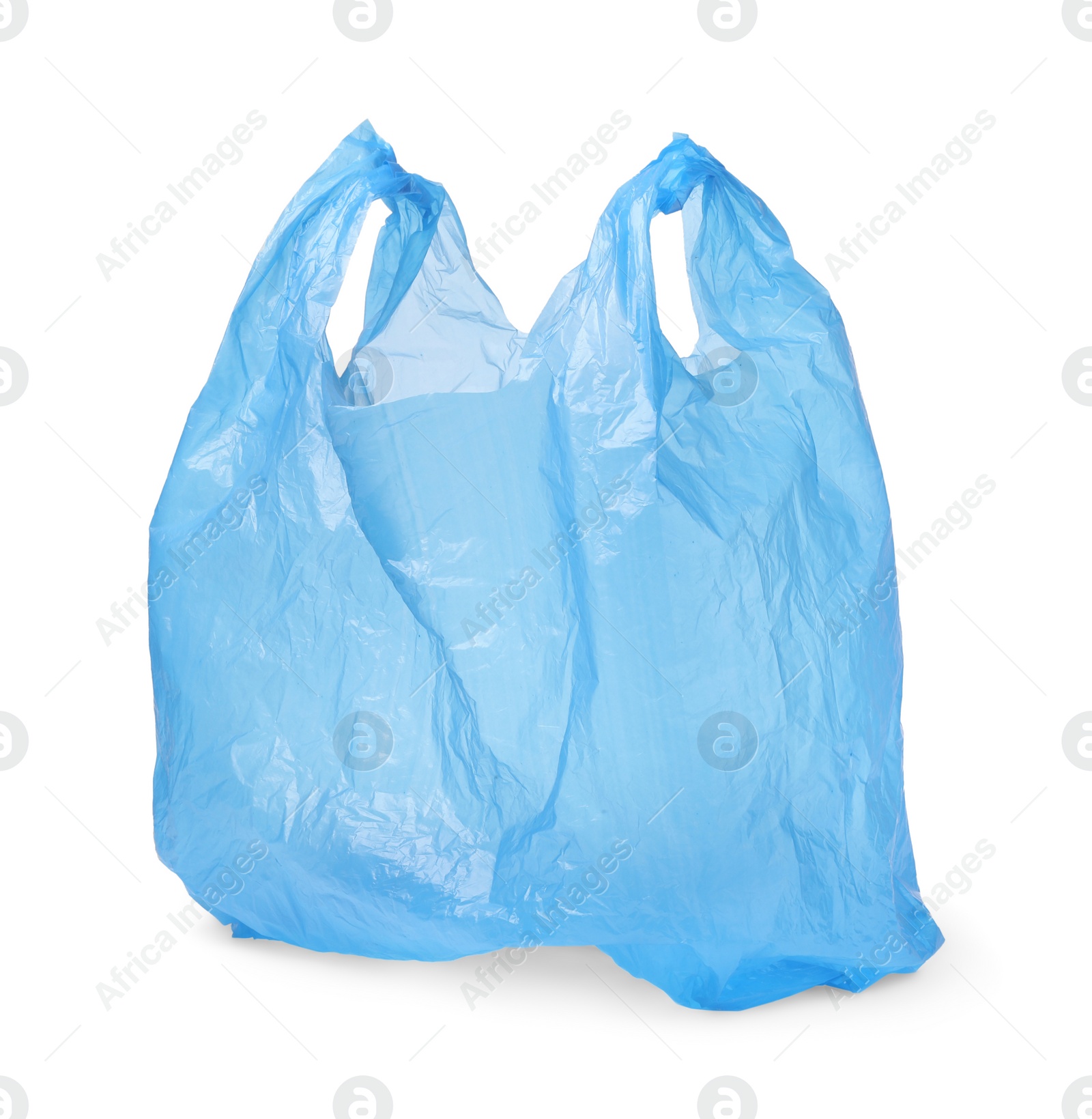 Photo of One light blue plastic bag isolated on white