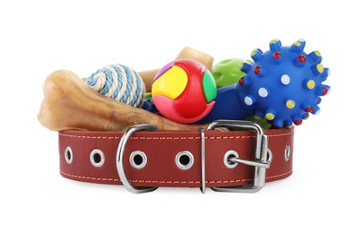 Photo of Pet toys, dog treat and collar isolated on white