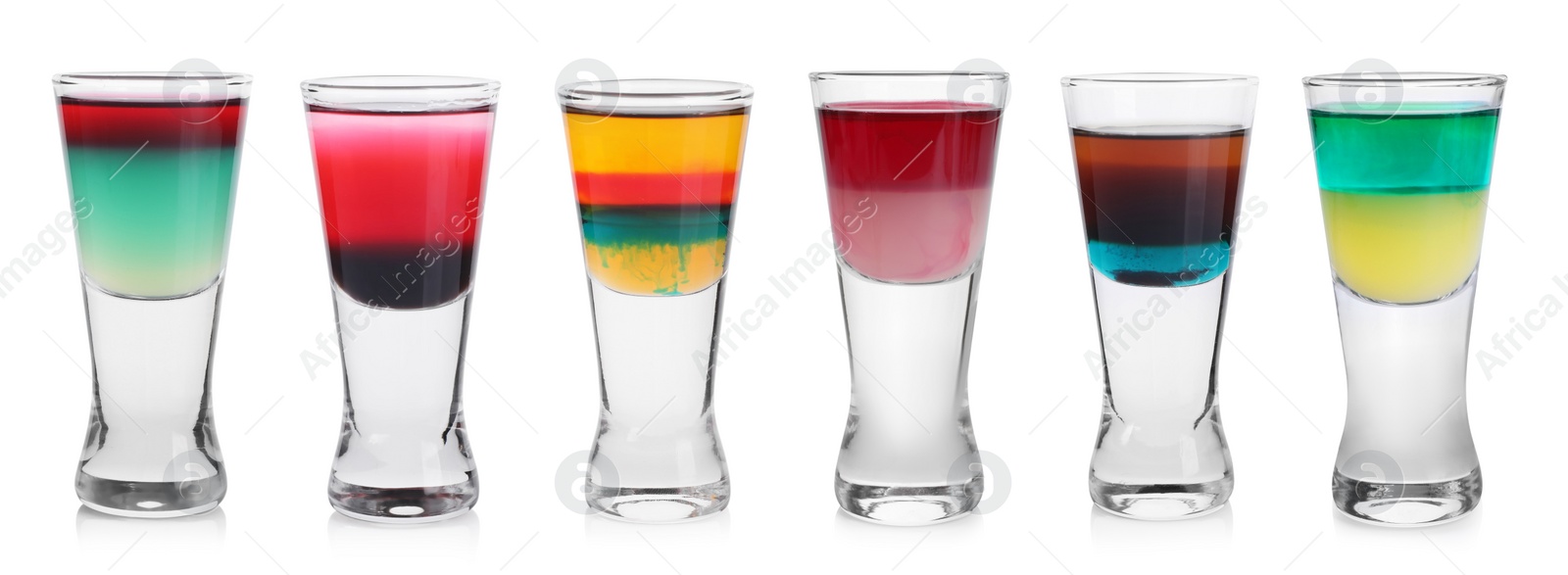 Image of Different shooters in shot glasses isolated on white, set