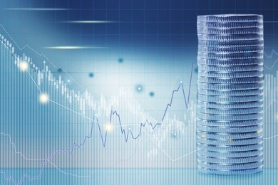 Image of Investment concept. Stack of coins and charts on light background