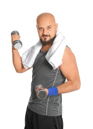 Overweight man doing exercise with dumbbells on white background