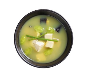 Photo of Bowl of delicious miso soup with tofu isolated on white, top view