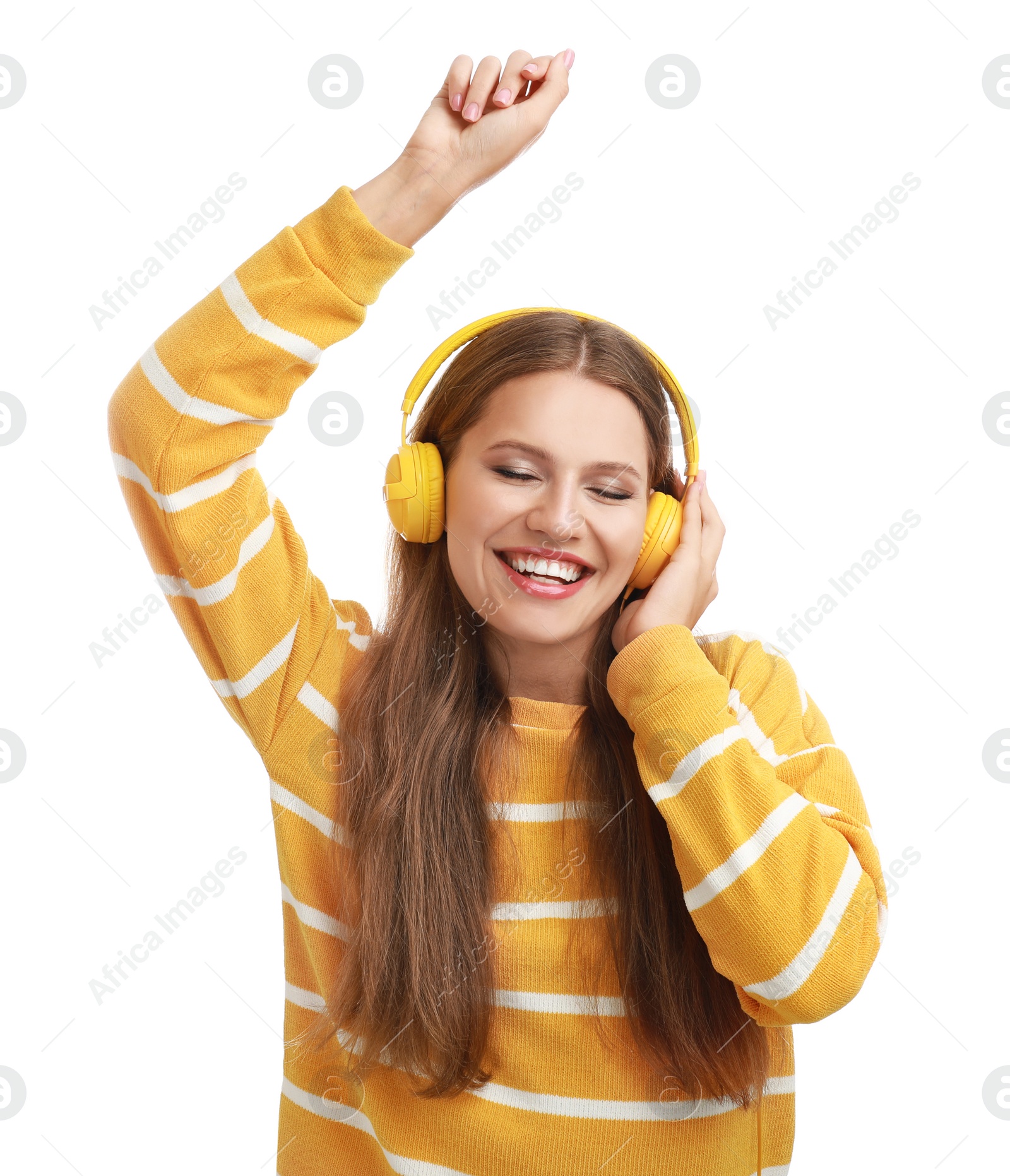 Photo of Young woman listening to music with headphones on white background