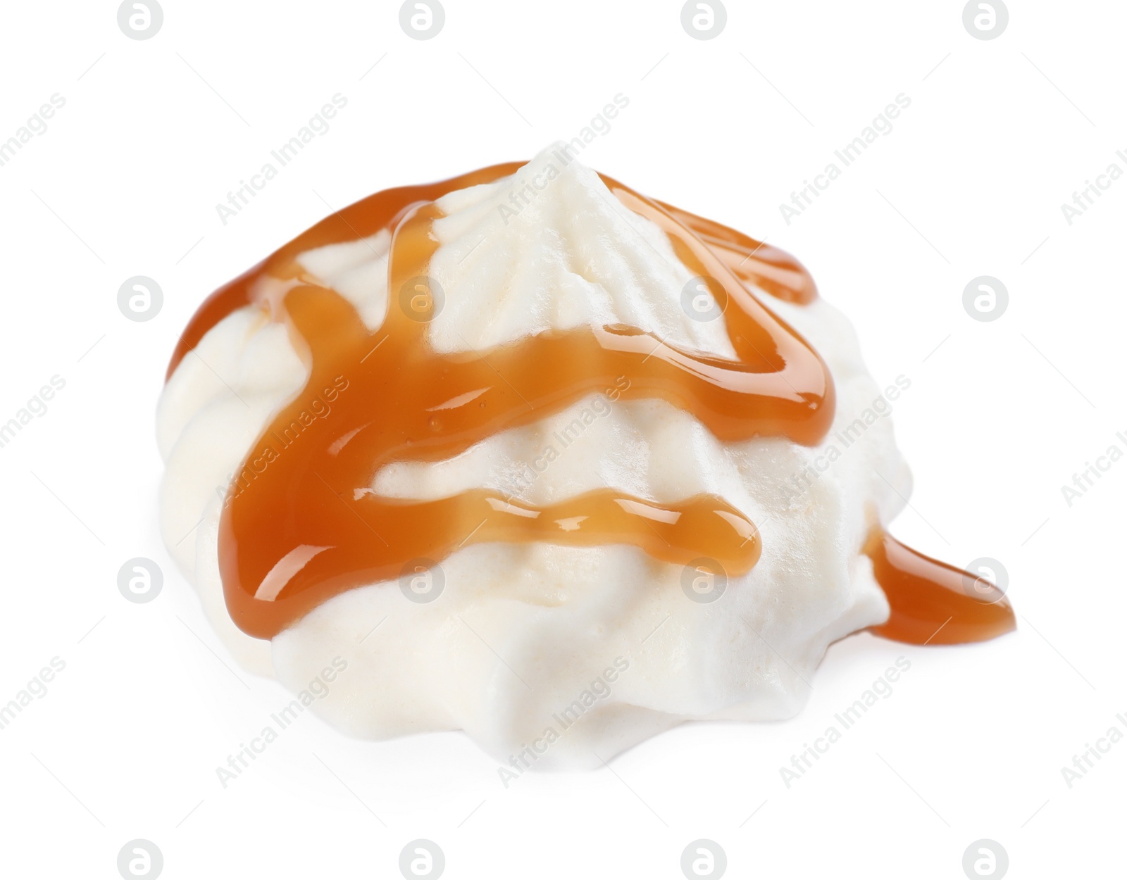 Photo of Delicious fresh whipped cream with caramel sauce isolated on white