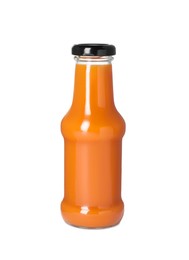 Fresh carrot juice in glass bottle isolated on white