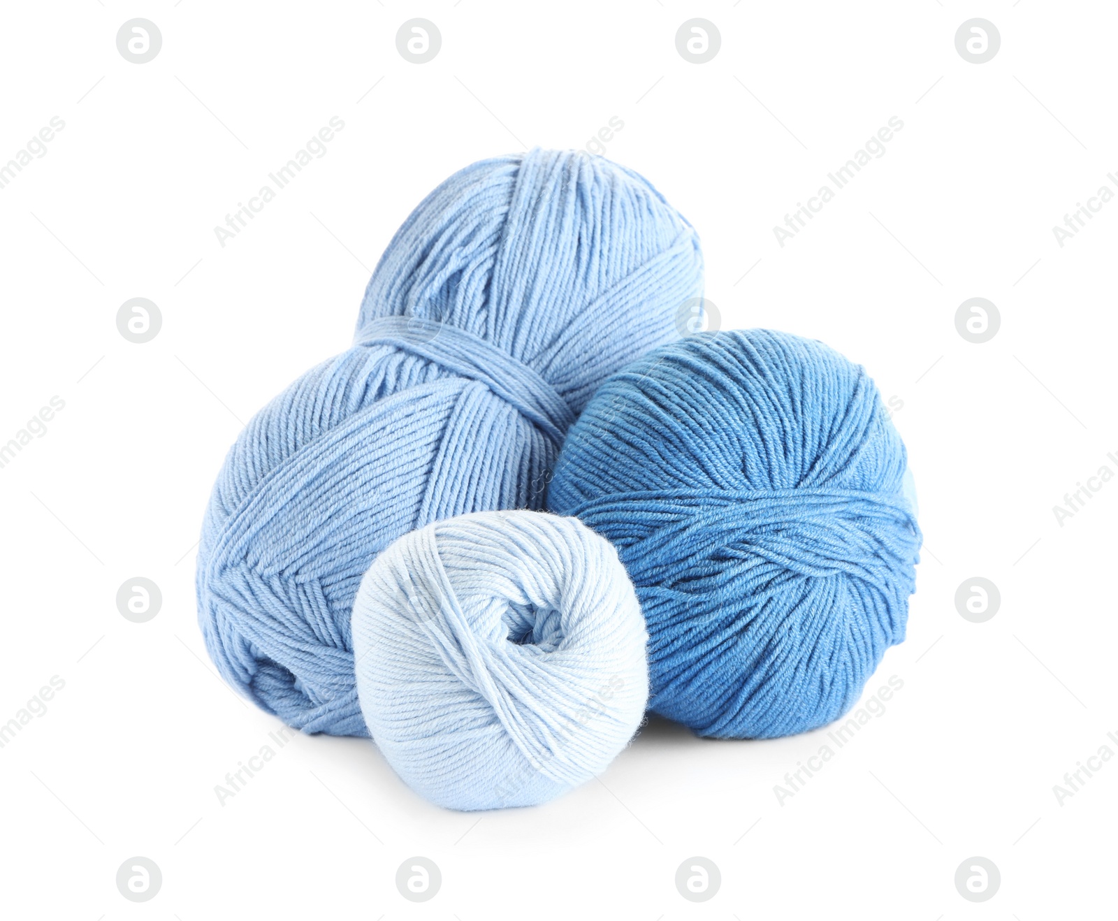 Photo of Different soft colorful woolen yarns on white background