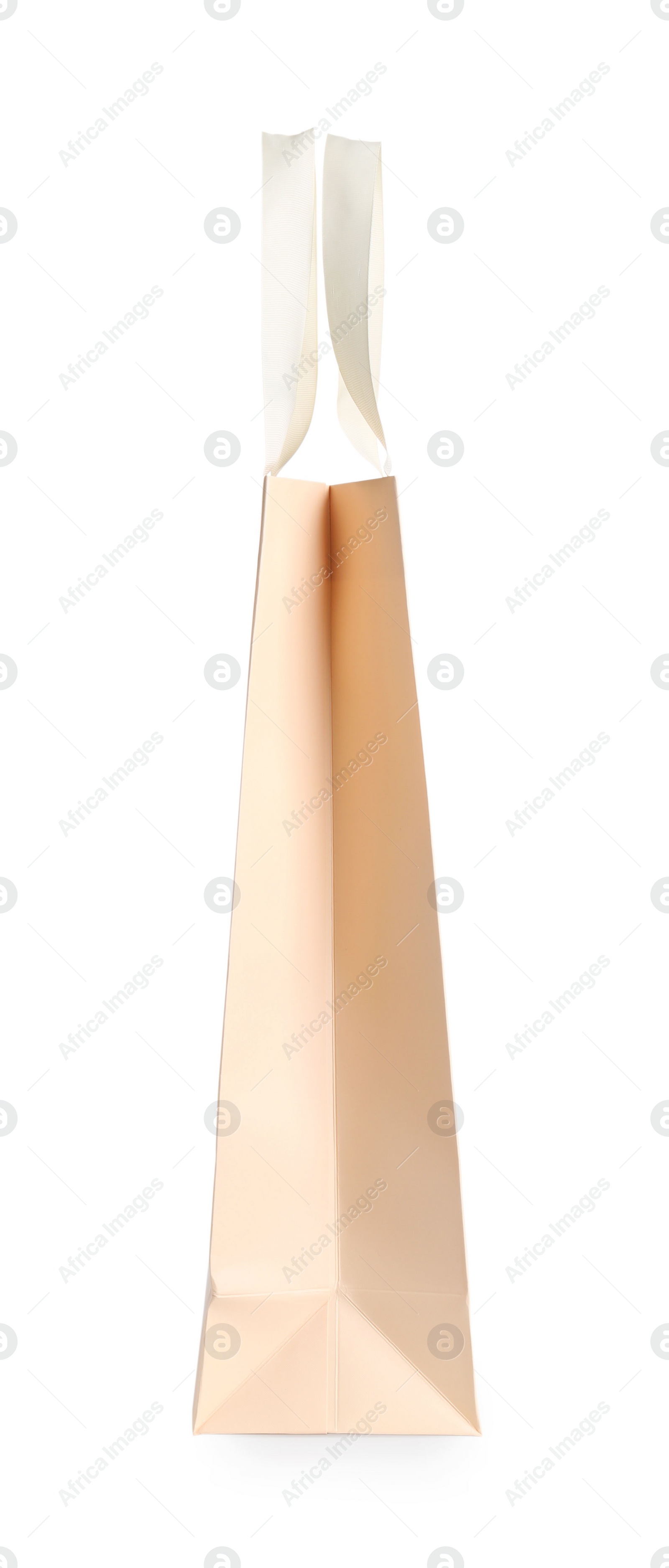 Photo of One paper bag isolated on white. Mockup for design