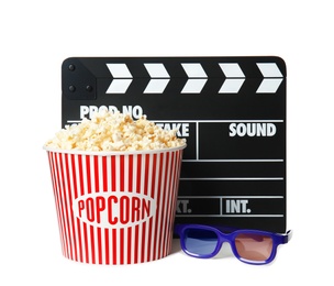 Photo of Popcorn bucket, clapper and glasses isolated on white. Cinema snack