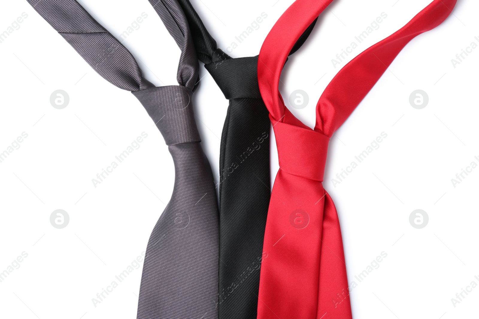 Photo of Group of colorful neckties isolated on white