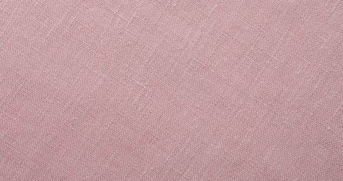 Photo of Texture of pink fabric as background, top view