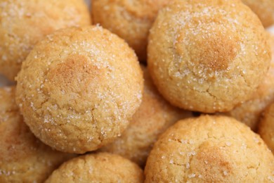 Photo of Tasty sweet sugar cookies as background, closeup