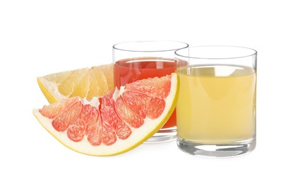 Photo of Glasses of different pomelo juices and fruits isolated on white
