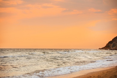 Photo of Beautiful view of sea coast at sunset