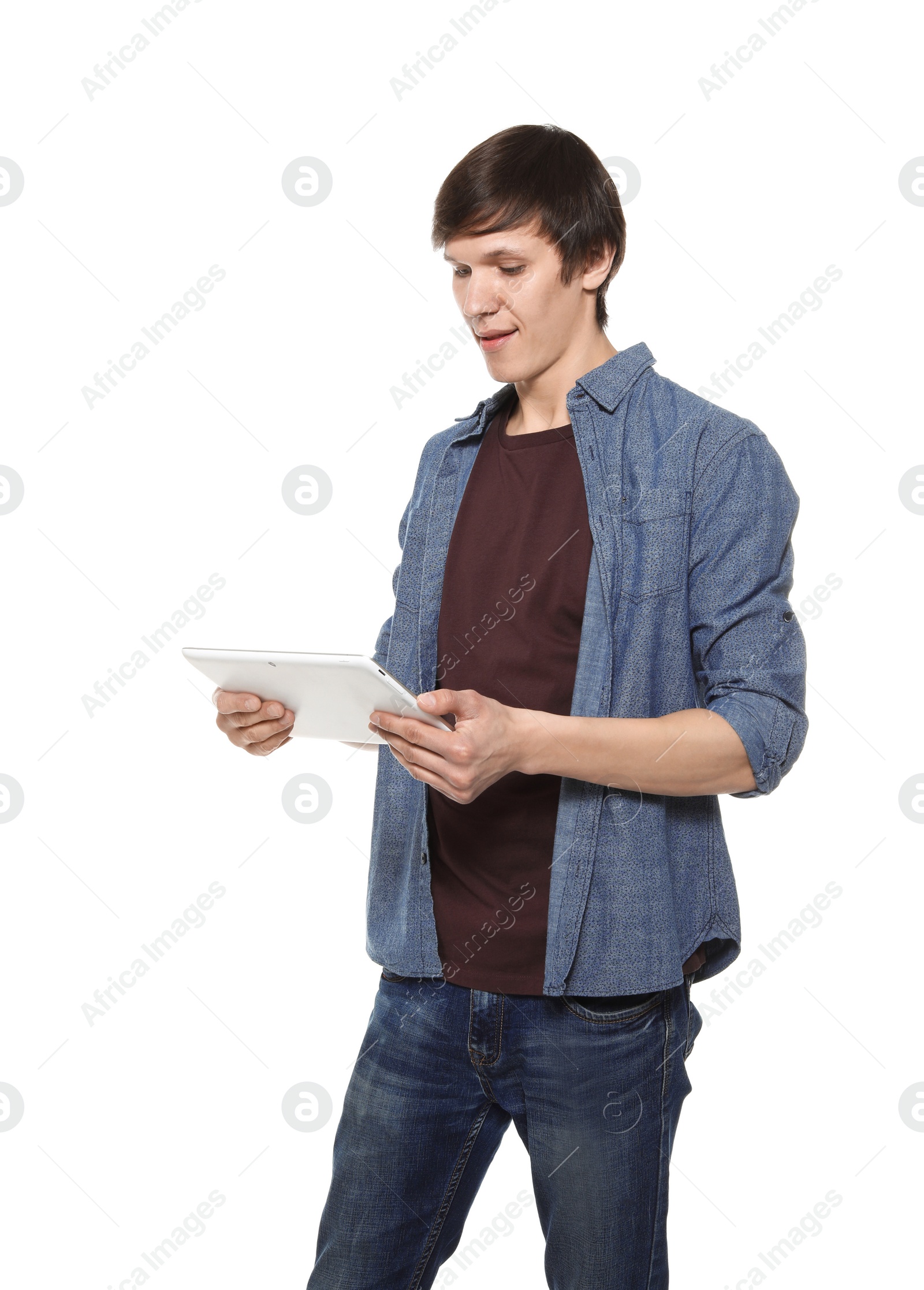 Photo of Portrait of confident young man with tablet on white background