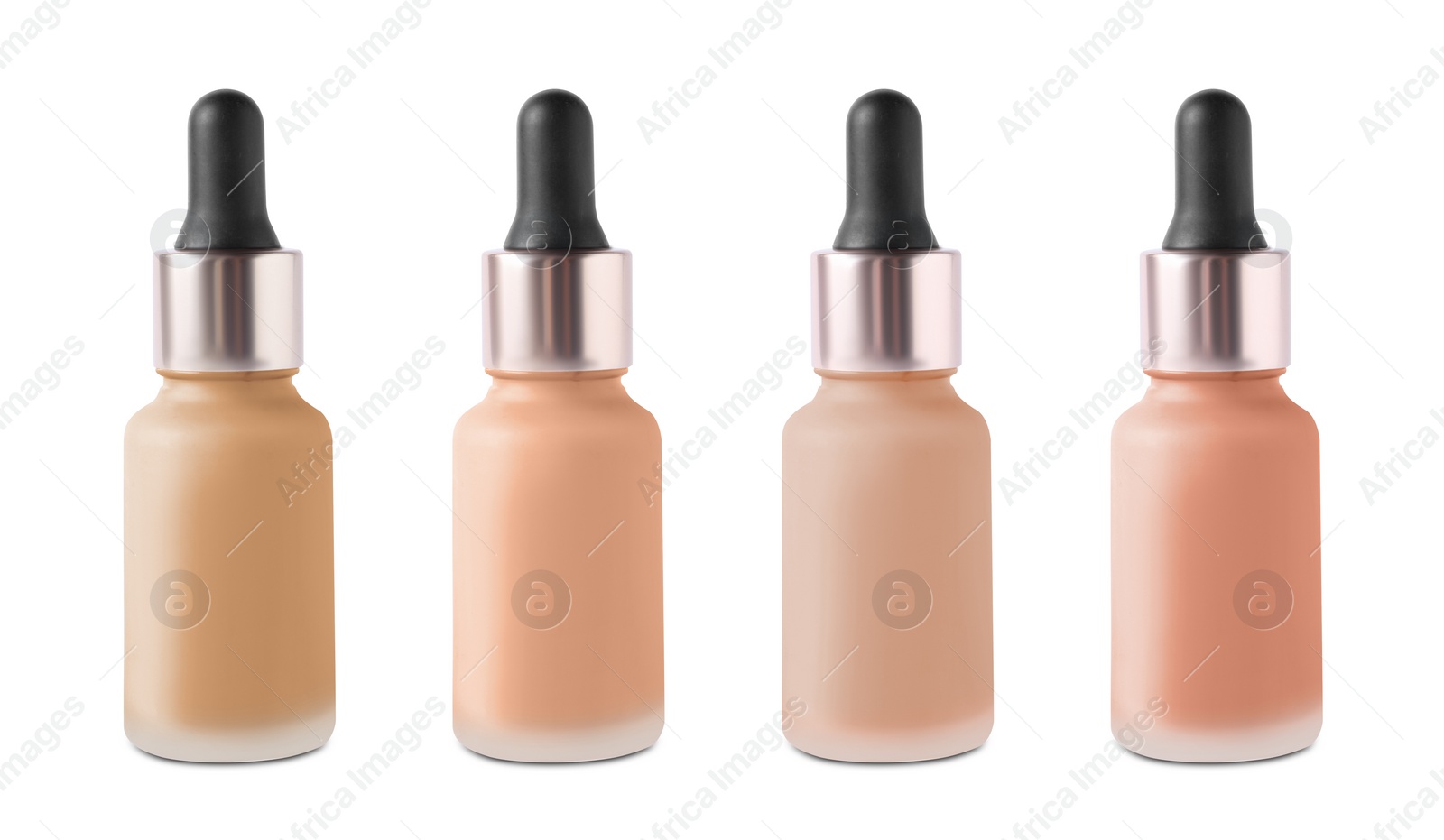 Image of Set of liquid foundations in different shades isolated on white