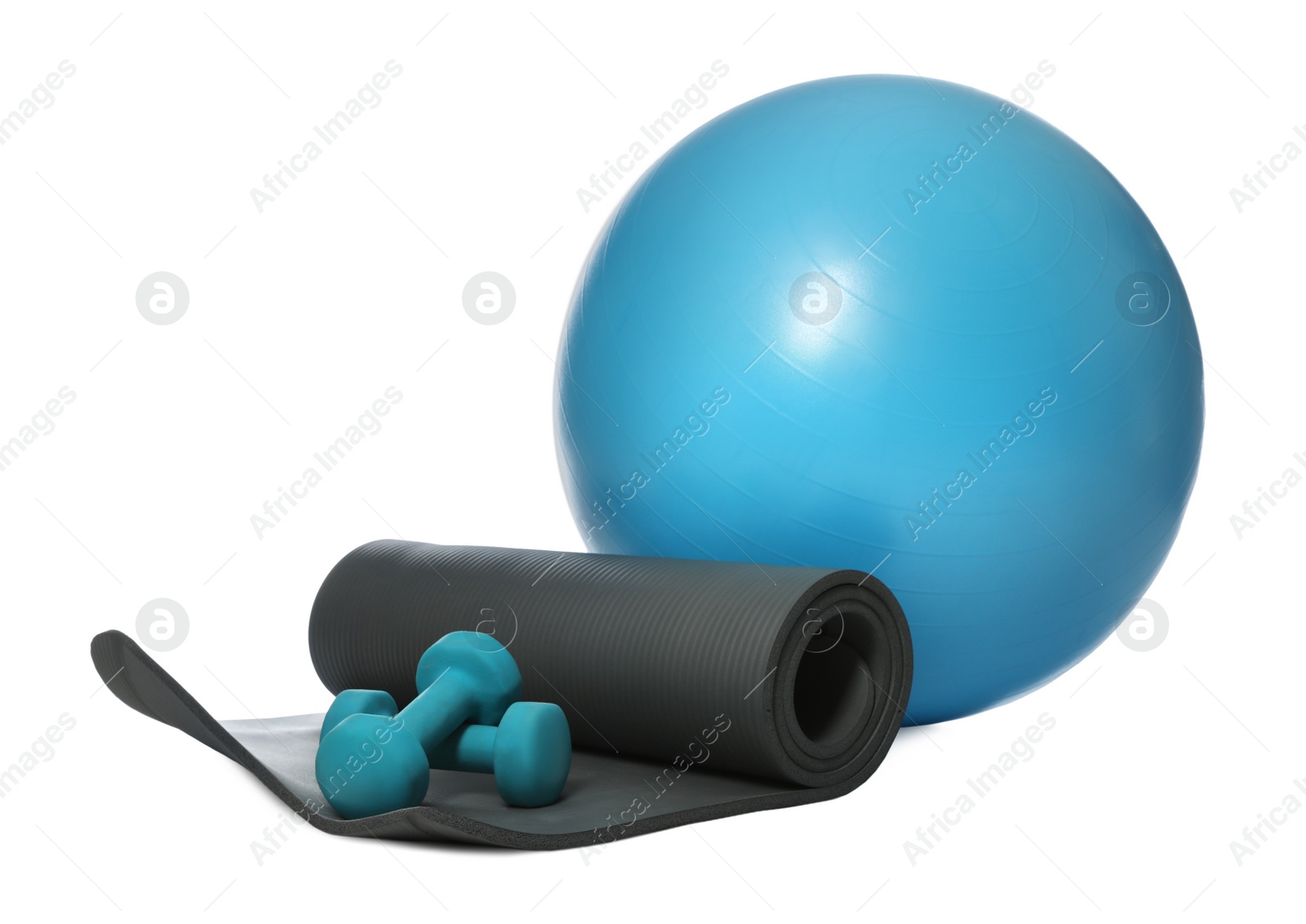 Photo of Fitness ball, yoga mat and dumbbells isolated on white