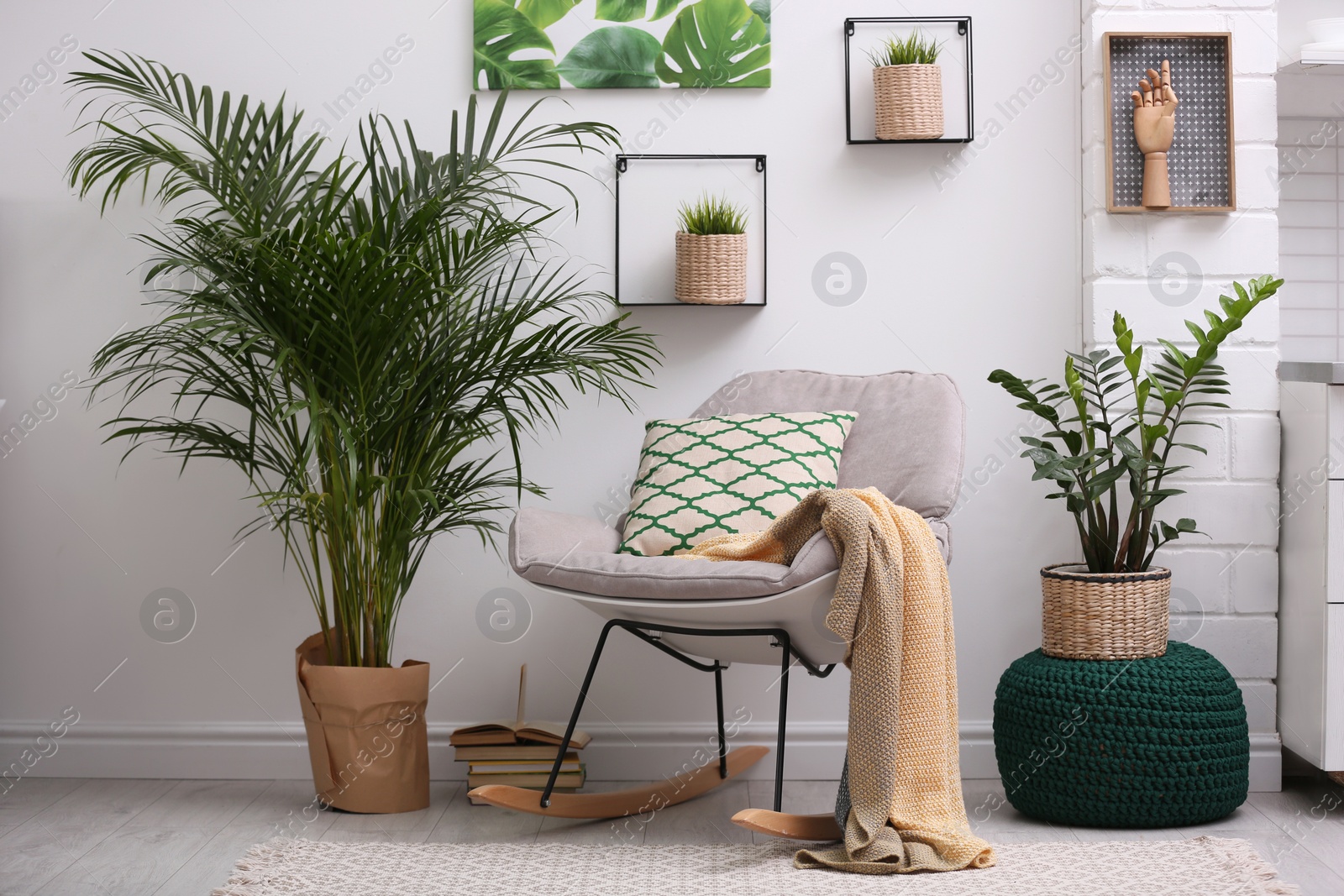 Photo of Stylish modern room interior with exotic houseplants