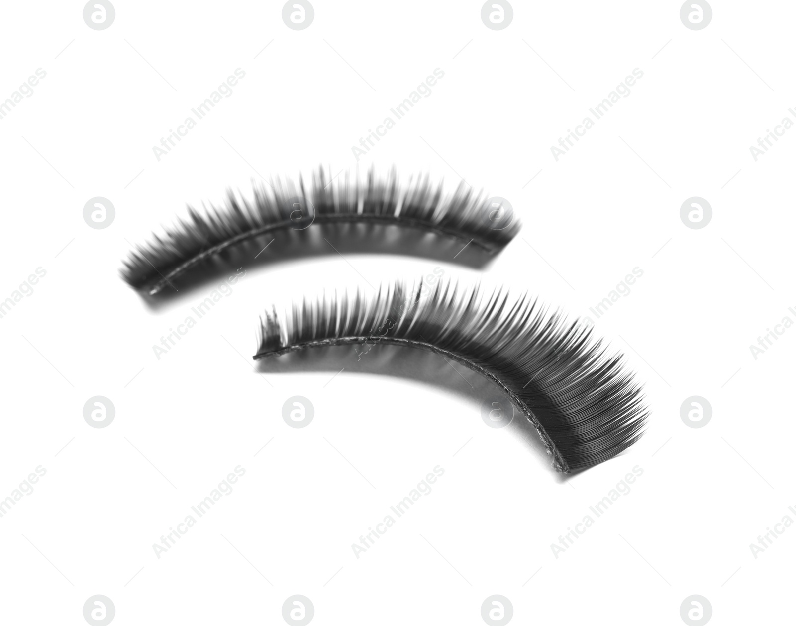 Photo of Beautiful pair of false eyelashes on white background