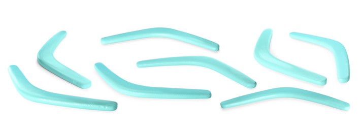 Image of Set with turquoise boomerangs on white background. Banner design
