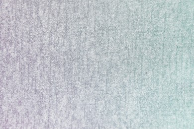 Photo of Texture of soft color fabric as background, top view