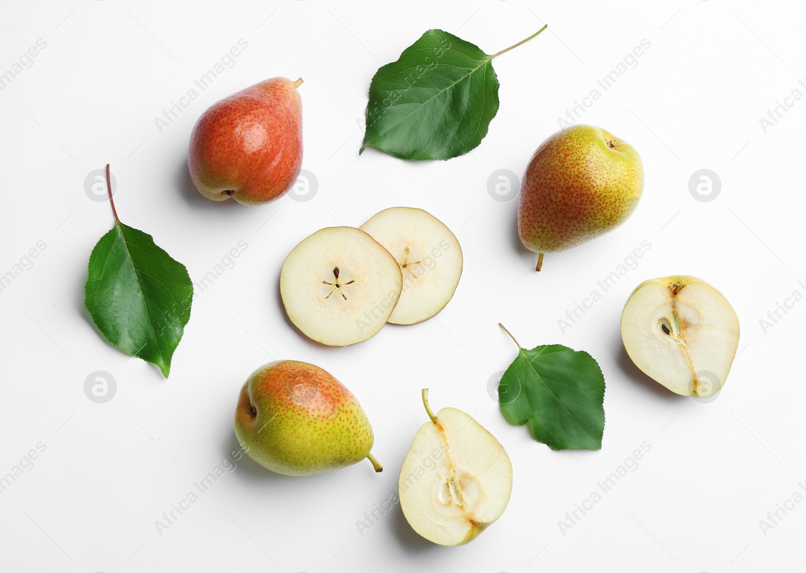 Photo of Ripe juicy pears on white background, top view