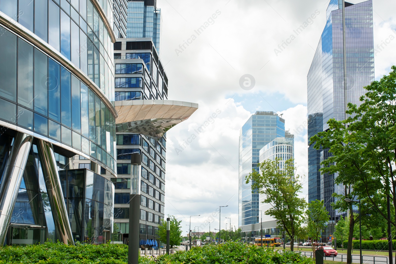 Photo of Beautiful buildings with many windows on cloudy day in city