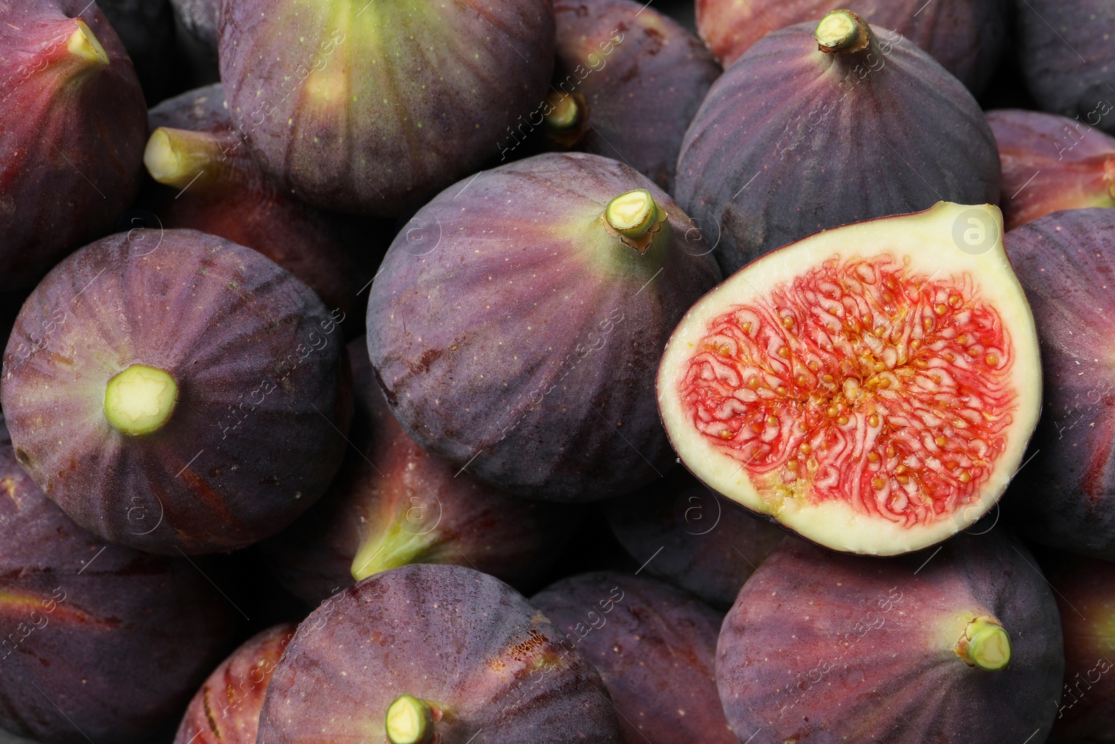 Photo of Fresh ripe figs as background, closeup view