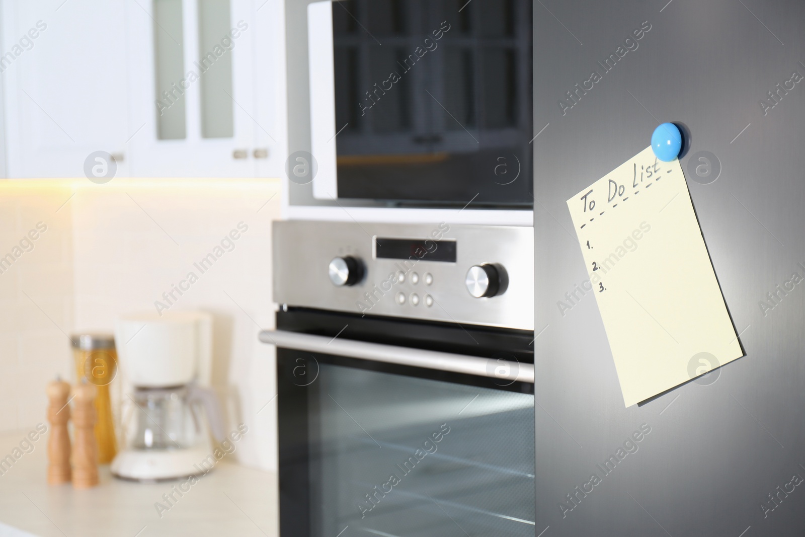 Photo of Blank To do list on fridge in kitchen. Space for text