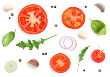 Image of Fresh ripe tomatoes with garlic, onion, basil, arugula and peppercorns on white background, top view