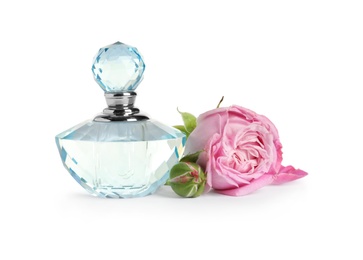 Bottle of luxury perfume and beautiful flower isolated on white