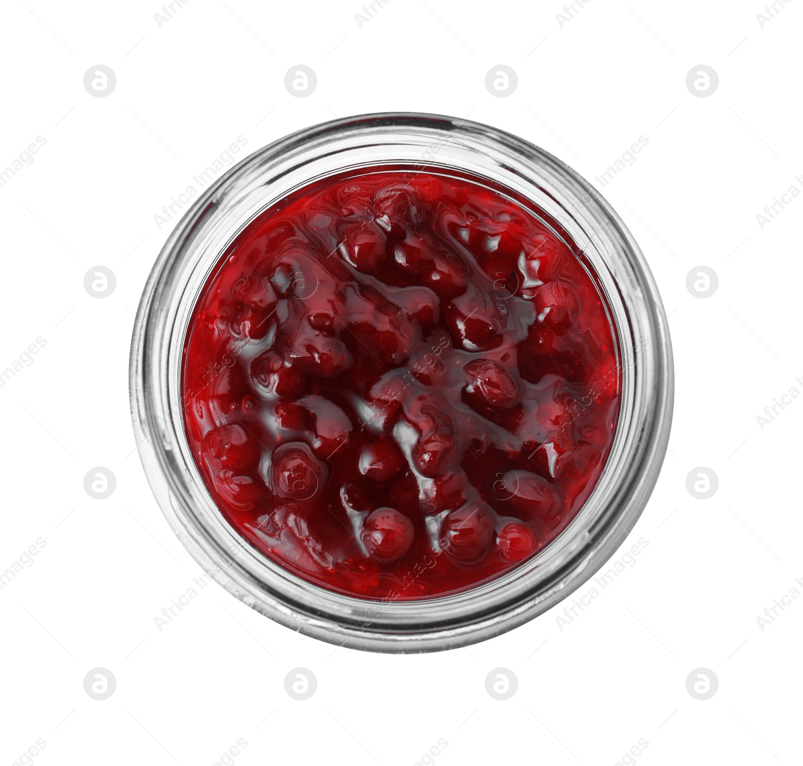 Photo of Fresh cranberry sauce in glass jar isolated on white, top view