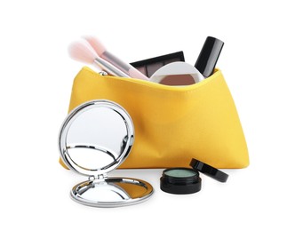 Stylish pocket mirror and cosmetic bag with makeup products on white background