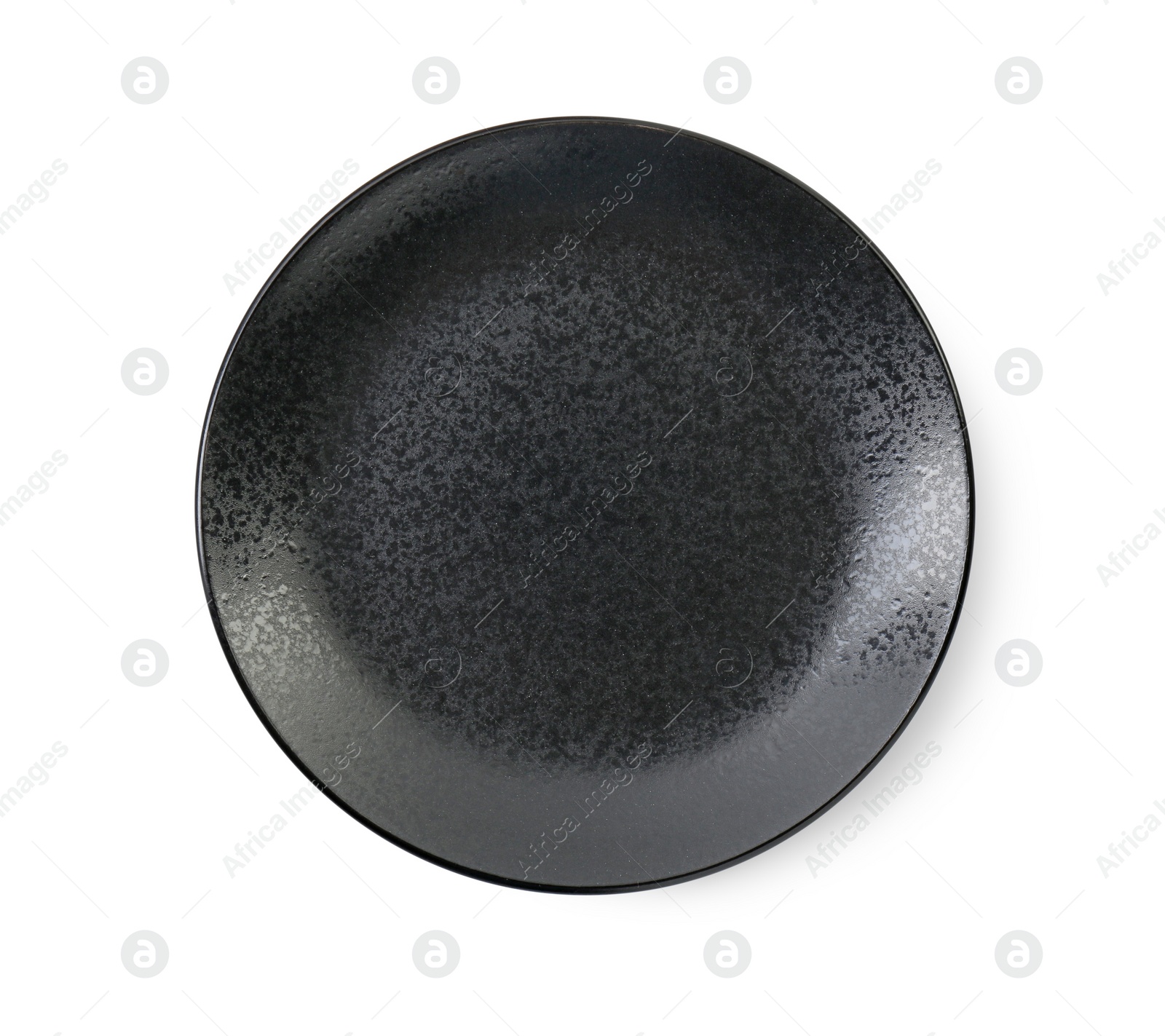 Photo of One black ceramic plate isolated on white, top view