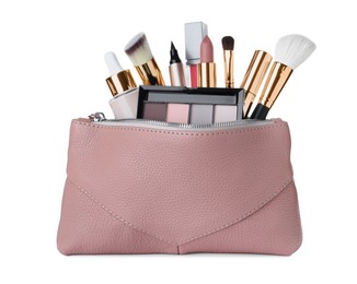 Different luxury decorative cosmetics and brushes in pink case on white background